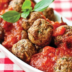 Fried meatballs in tomato sauce